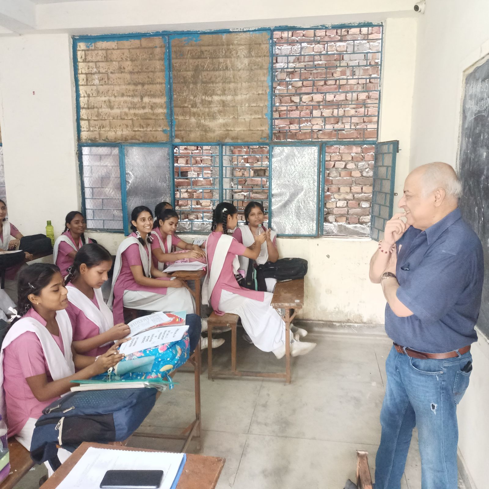 School students and team members celebrating a program milestone